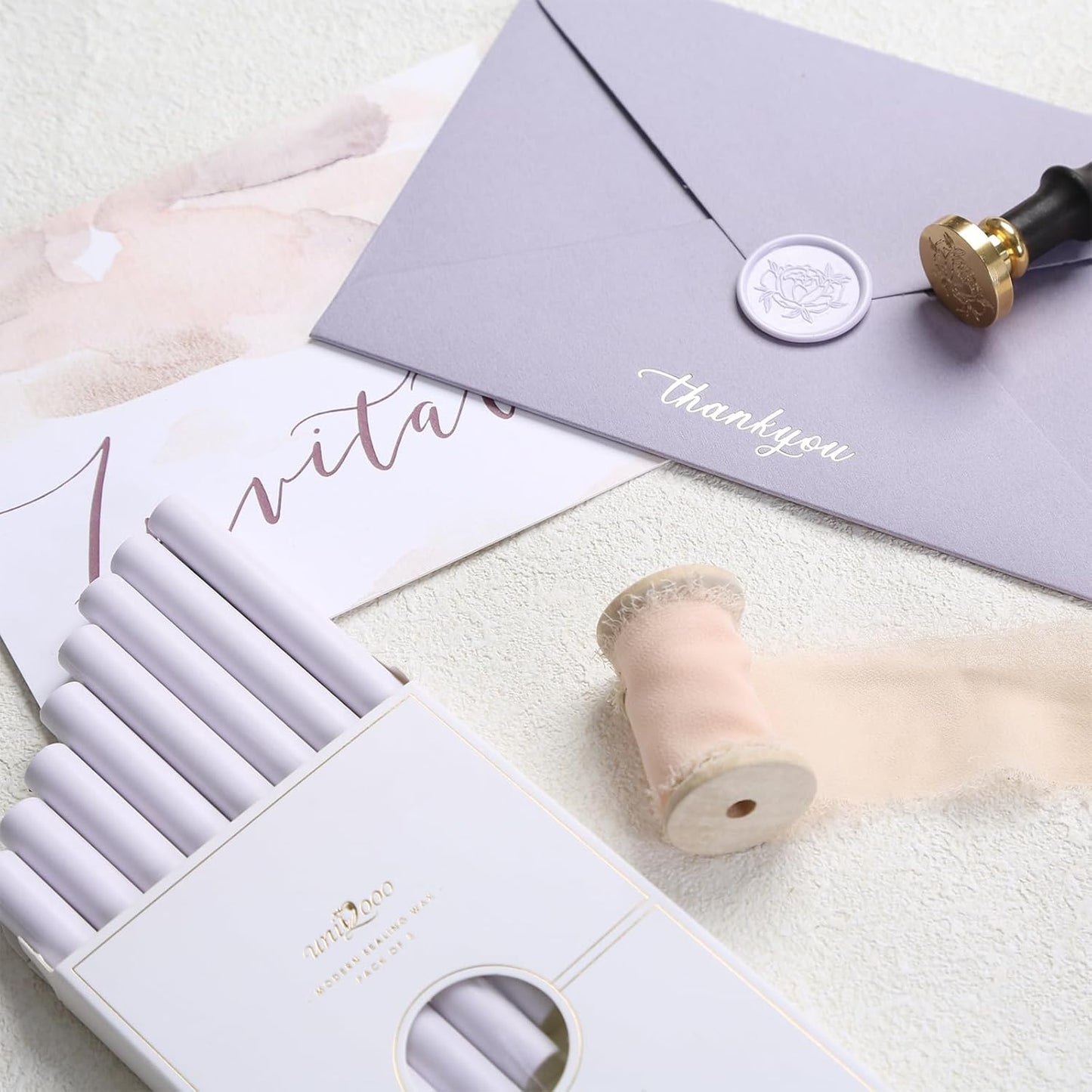 UNIQOOO Light Lavender Glue Gun Sealing Wax Sticks for Wax Seal Stamp - Perfect for Wedding Invitations, Thank You Card, Mails, Wine Gift Wrapping, Christmas Gift, Pack of 8